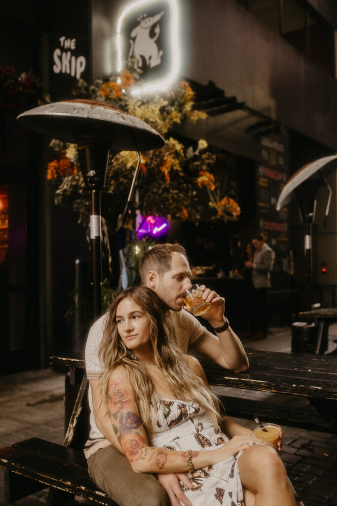 ENGAGEMENT PHOTOS MADE INTO A DATE NIGHT BY ENJOYING A DRINK AT TRENDY DETROIT SPOTS