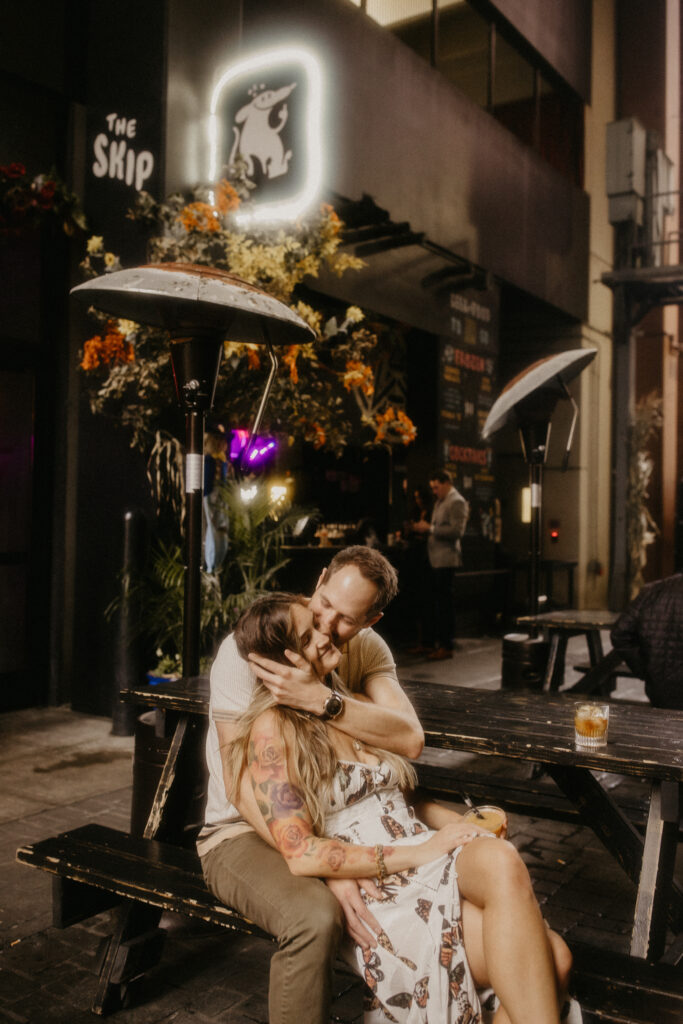 ENGAGEMENT PHOTOS MADE INTO A DATE NIGHT BY ENJOYING A DRINK AT TRENDY DETROIT SPOTS